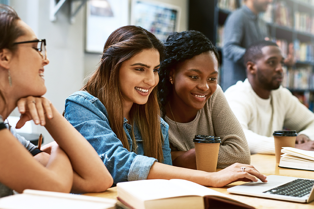 Multiple university students, looking at a screen